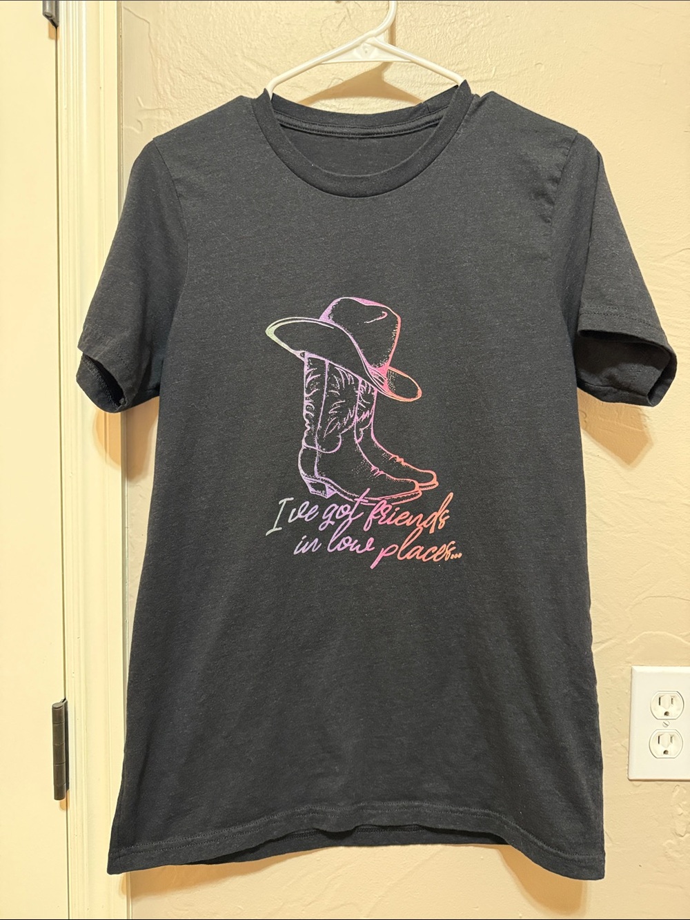 Women's Black Graphic Tee with Pastel Cowboy Boot Design